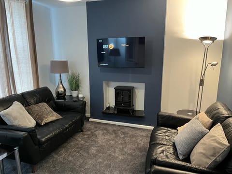 Lounge - Spacious and relaxing living room with Smart TV and Electric fire