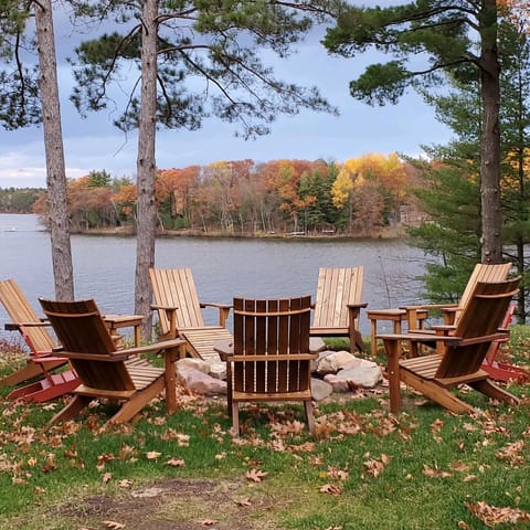 Beautiful Fall View with Adirondack Chairs and Fire Pit