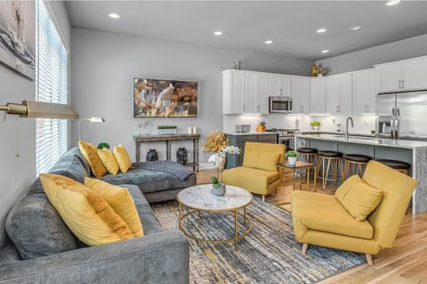 2nd Floor: Bright and Open Living Area featuring a Smart TV and designer furnishings