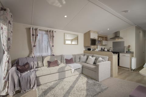 Cosy living room with stunning views and modern amenities. Free WiFi & Netflix!