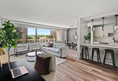 This open-concept living space seamlessly connects the living, dining, and kitchen areas, offering plenty of room for you to relax, entertain, and enjoy quality time with loved ones.