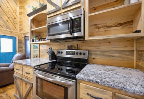 Prepare your favorite meals on this well-equipped stove and spacious countertop.