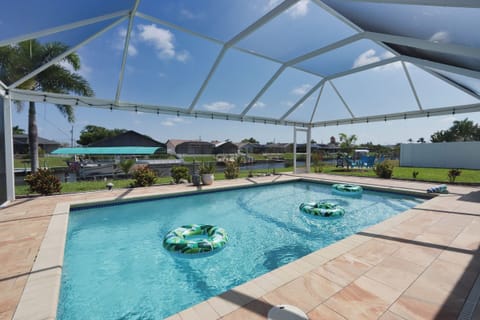 Dive into fun in your private heated pool with front-row seats to the peaceful canal — splash, float, and chill all day long!