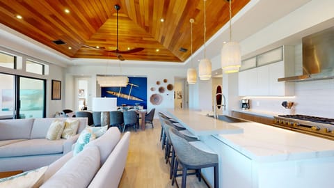 Open concept great room with gorgeous vaulted ceilings