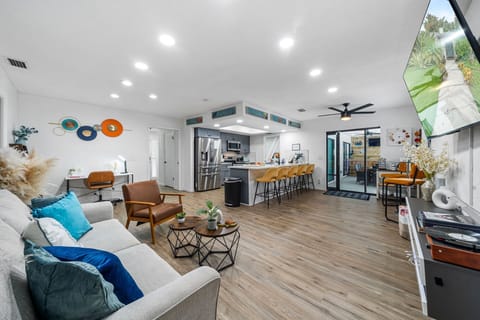 Spacious and inviting, this second living area is perfect for family movie nights, board games, or simply relaxing together. With an open layout to the kitchen and patio, it’s designed for comfort and connection during your Florida getaway. 