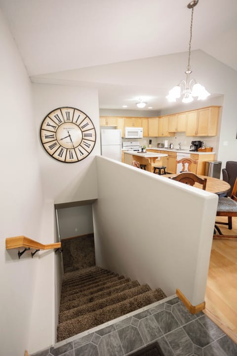 To the left of the front door you'll find the stairs to the basement. 