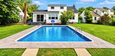Take a refreshing dip and enjoy the clear, inviting water just steps from the house. Perfect for relaxing swims, cooling off on warm days, or simply unwinding in your own backyard space 