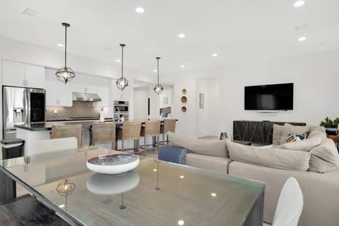 Spacious living space with ample seating, and Smart TV
