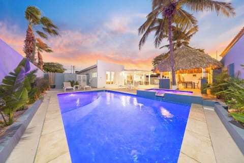 Enjoy a nighttime dip in our beautifully illuminated pool, surrounded by a serene setting that glows with elegant charm