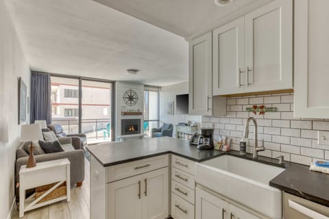 Cook with ease in our functional kitchen featuring essential appliances and a clean, practical layout for all your meal prep needs.