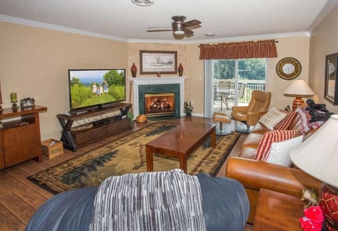 Spacious Living Room with Gas Fireplace, Sleeper Sofa and SMART TV with Cable & WIFI throughout vacation rental