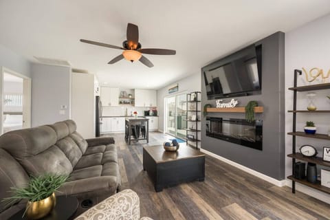Upstairs Open Concept Living Area with Sliders to the Deck