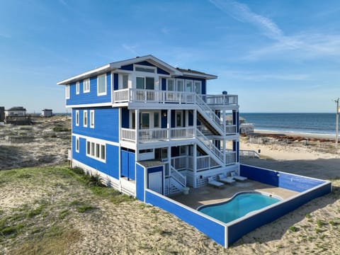 View of the pool on the side of the house