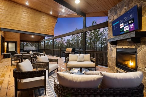 One of the best features of the cabin is our expansive deck with views of the pines.