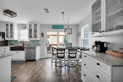 Large kitchen with dinning area and coffee bar