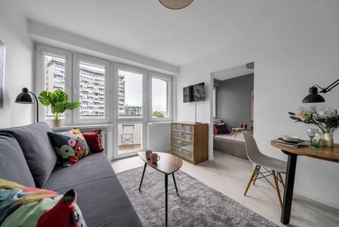Comfortable Living Room with Sofa Bed and Smart TV | Book Now with RENTUJEMY