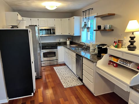 Main floor full kitchen with k cups/coffee and tea provided.