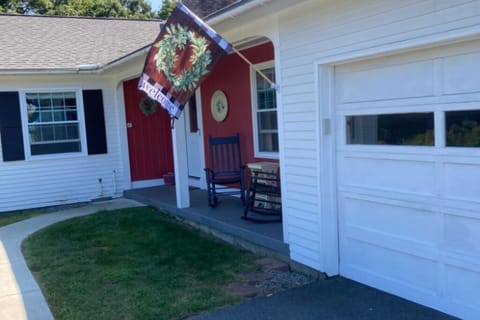 Front of house with attached garage
