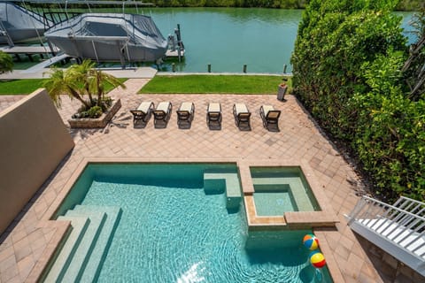 Overlooking our pristine pool and spa. Perfect for a tranquil getaway! 