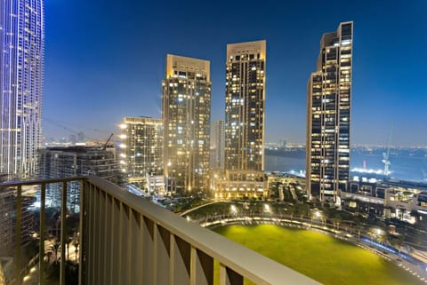 Balcony View: Stunning skyline lights and vibrant cityscapes await your unforgettable stay!