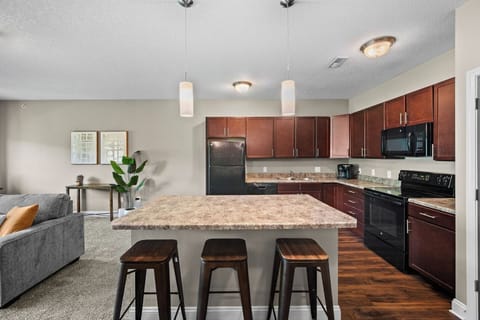 The eat-in kitchen with seating at the island.