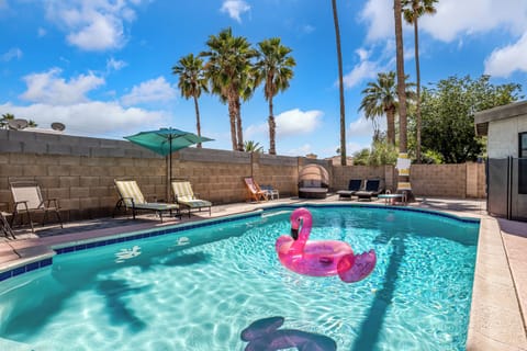 Relax in our sparkling backyard pool—ideal for sunny Scottsdale days.