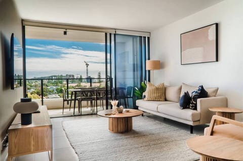 Welcome to your cosy retreat! Our inviting living area is designed for relaxation and comfort. Sink into our comy sofa, unwind with your favorite shows on the Smart TV, or enjoy a good book in our relaxing environment.  