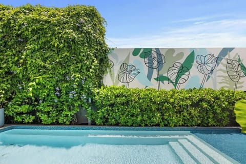 Experience a boutique hotel with a personality. Our exterior boasts a refreshing pool, open-air gym, and quirky signage that reflects our playful spirit.