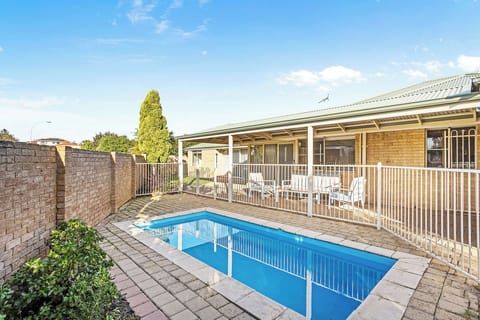 Outdoor Retreat: Dive into relaxation beside your private pool, sun-soaked and inviting!