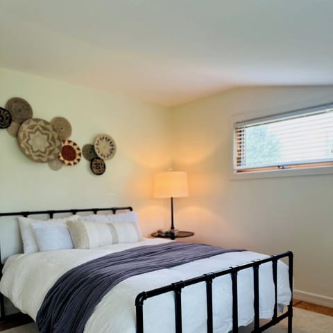 Queen size bed on the main floor