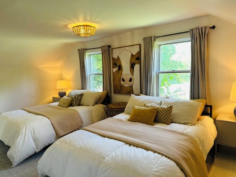 2nd bedroom, 2 full size beds and a roll away twin available.