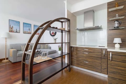 A perspective showing the open connection between kitchen and living space.