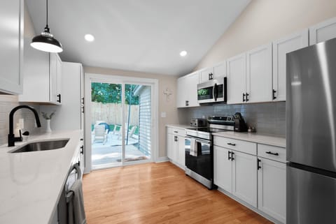 The kitchen is equipped with essentials for cooking a delicious meal. 
