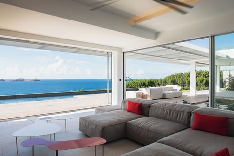 Air conditioning, HD-TV, Dish Network, DVD player, iPod docking station, stereo. The living room opens onto the expansive terrace and the panoramic views. 