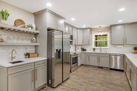 Fully Stocked Kitchen: Enjoy a spacious, fully equipped kitchen featuring all the dishes, utensils, and appliances you need to prepare meals with ease.