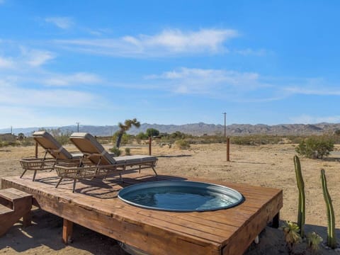 The perfect outdoor deck area with cowboy pool, perfect for relaxation and viewing the stars. 