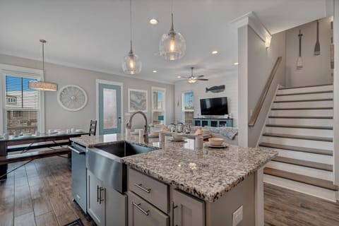 The open floor plan ensures you won't miss a beat no matter where you are