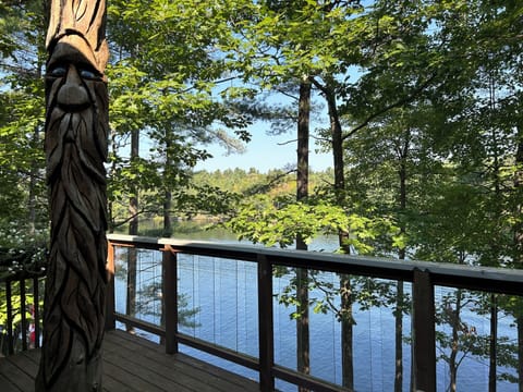 Say hello to Si, he was carved out of a tree that ran through the deck!