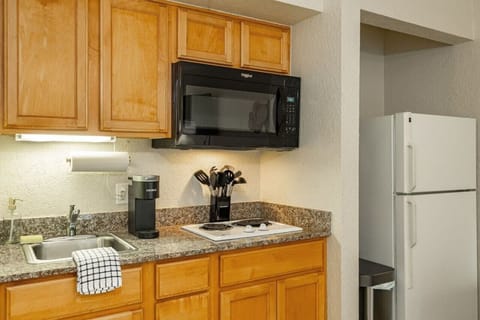 Whip up something simple or brew a fresh cup of coffee—everything you need is within arm’s reach.