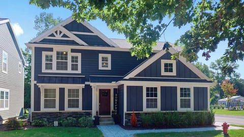 Welcome to SoHa Poolside Haven! A 4 bedroom, 3.5 bathroom home just steps away from the year-round pool in Harbor Club of South Haven!