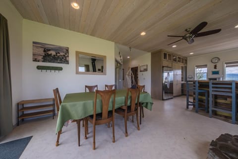 Open dining and kitchen area with fireplace