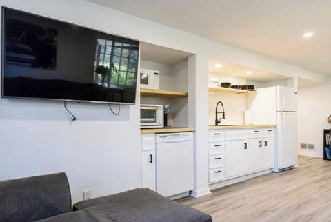 Living Room: Our living area offers the perfect spot for lounging, with a TV setup for all your entertainment needs!