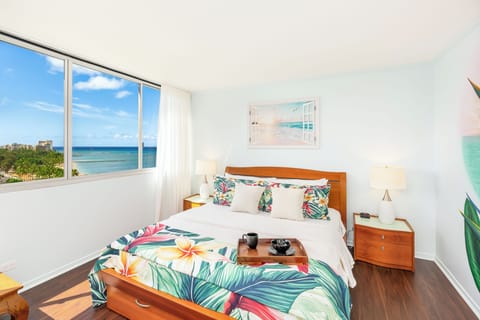 Experience tranquility in a bedroom that offers breathtaking vie