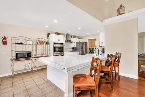 Kitchen bar counter with seating for 3