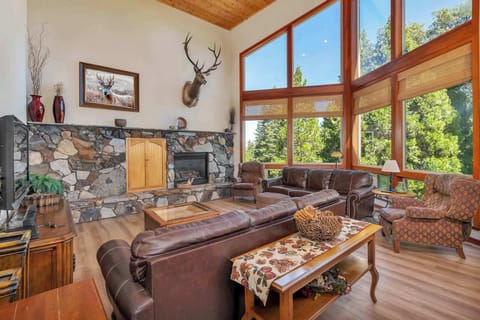 Relax in the living room by the fireplace & stream your favorite entertainment