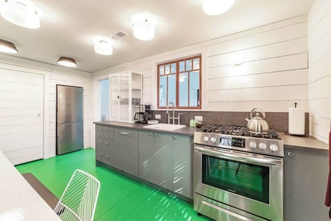 The kitchen, with a dishwasher integrated into the cabinetry.