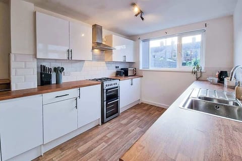 Modern and functional kitchen area, designed for preparing delicious meals and making cooking a pleasure.