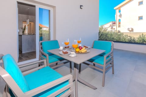 A spacious balcony where you can relax and enjoy tranquil setting with views.