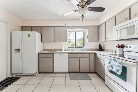 Indoors, Kitchen, Ceiling Fan, Refrigerator, Microwave