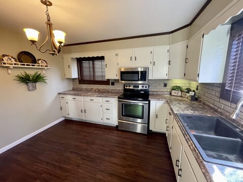 Large fully equipped kitchen with all utensils necessary